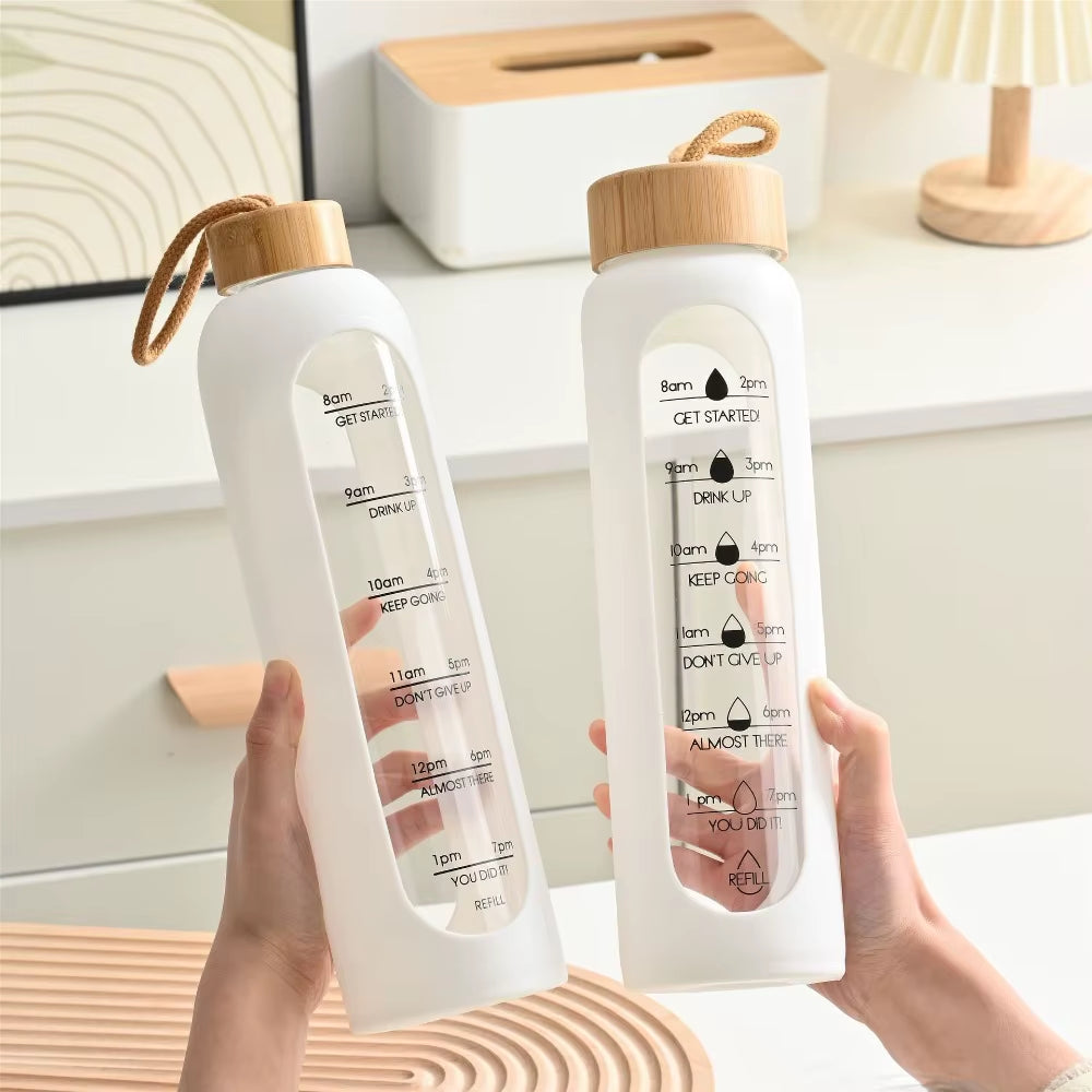Stay Hydrated in Style: 32Oz Motivational Time-Marked Glass Water Bottle with Bamboo Lid and Eco-Friendly Silicone Sleeve