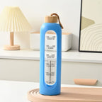Stay Hydrated in Style: 32Oz Motivational Time-Marked Glass Water Bottle with Bamboo Lid and Eco-Friendly Silicone Sleeve